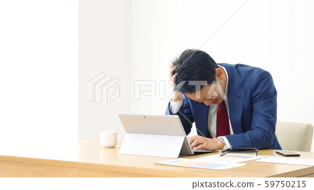 Worried businessman Worried businessman 59750215