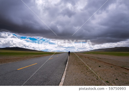 asphalt road on plains in Himalayas with mountain  59750993