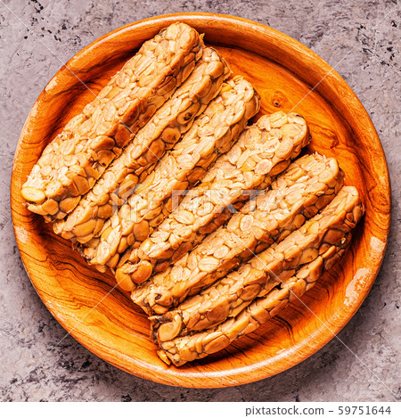 Sliced fresh raw tempeh, traditional Indonesian Sliced fresh raw tempeh, traditional Indonesian 59751644