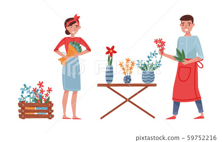 Floristry Concept. Flower Arrangers Taking Care of Plants and Flowers 59752216