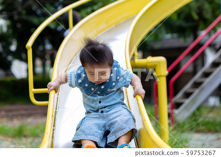 Infants playing in the park 59753267