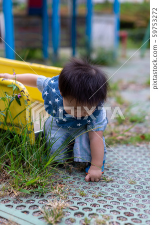 Infants playing in the park 59753272