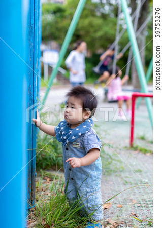 Infants playing in the park 59753276