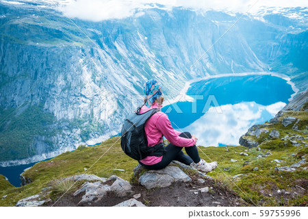 Norway hike. Sporty woman near Trolltunga Norway hike. Sporty woman near Trolltunga 59755996