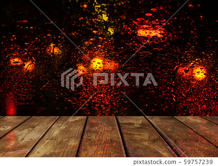 Rain drops on glass surface with red bokeh night Rain drops on glass surface with red bokeh night 59757239
