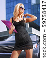 business lady with folder on street 59758417