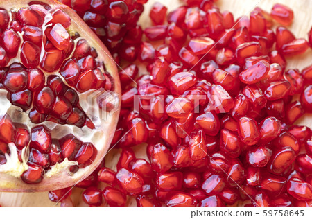 Seeds of a pomegranate that is red Seeds of a pomegranate that is red 59758645