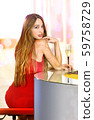 beautiful single woman in a bar 59758729