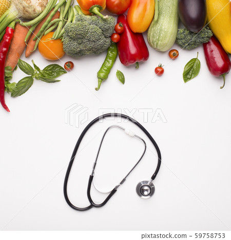Fresh vegetables for balanced nutrition and stethoscope 59758753