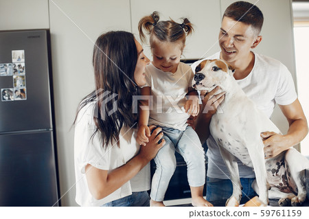 Family cook the dough for cookies at the kitchen Family cook the dough for cookies at the kitchen 59761159
