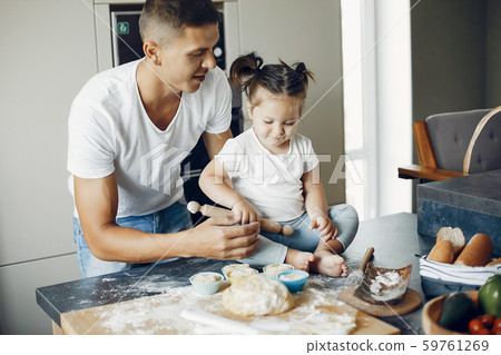 Family cook the dough for cookies Family cook the dough for cookies 59761269