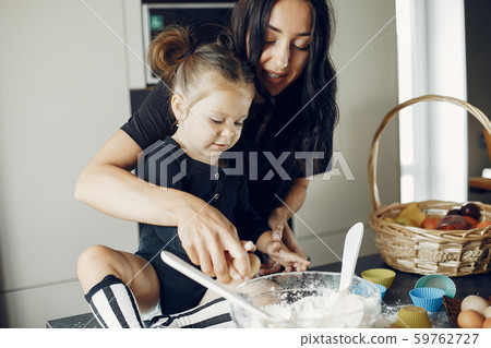 Family cook the dough for cookies Family cook the dough for cookies 59762727