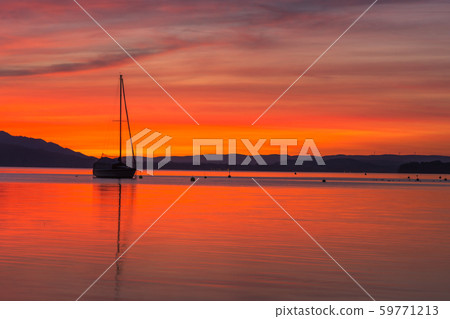 Dramatic Sunset At Lake Constance, Allensbach, Germany Dramatic Sunset At Lake Constance, Allensbach, Germany 59771213