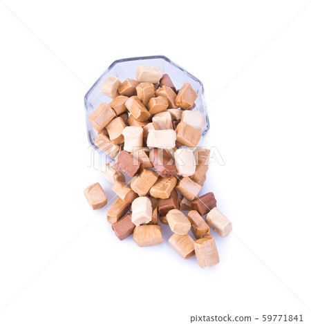 candies or caramel candies on a white background. candies or caramel candies on a white background. 59771841