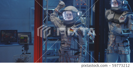 Astronauts and scientists testing spacesuit Astronauts and scientists testing spacesuit 59773212