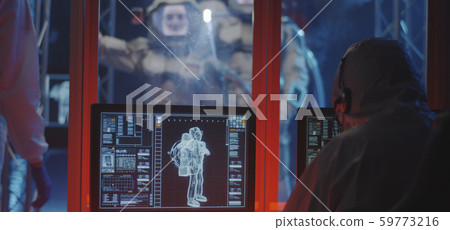 Astronauts and scientists testing spacesuit 59773216