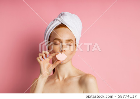 Portrait of lovely lady with naked shoulders isolated on pink background Portrait of lovely lady with naked shoulders isolated on pink background 59774117