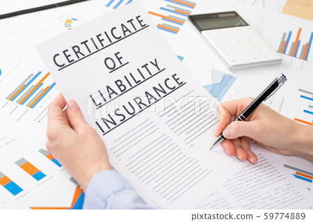 certificate of liability insurance concept, documents on the desktop 59774889