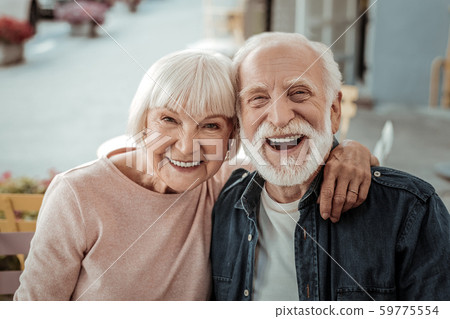 Joyful nice couple being in a great mood Joyful nice couple being in a great mood 59775554