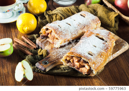 Traditional puff pastry strudel with apple Traditional puff pastry strudel with apple 59775963