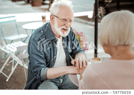Nice aged man looking at his beloved wife Nice aged man looking at his beloved wife 59776039