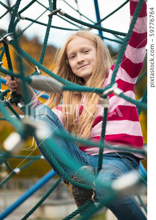 girl at playground 59776764