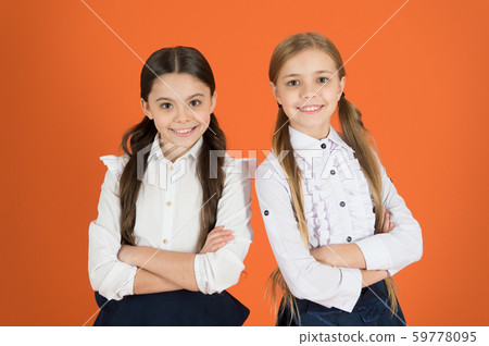 Keeping arms crossed. School children with a Keeping arms crossed. School children with a 59778095