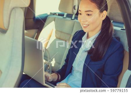 Pleased international female person preparing her project 59779155