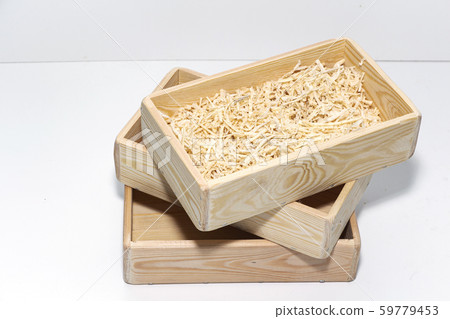 Empty wooden box. Made of pine, on a light white 59779453