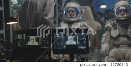 Astronauts testing spacesuit camera Astronauts testing spacesuit camera 59780240