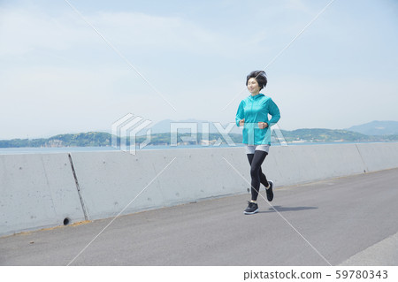 Female Middle Age Running Female Middle Age Running 59780343
