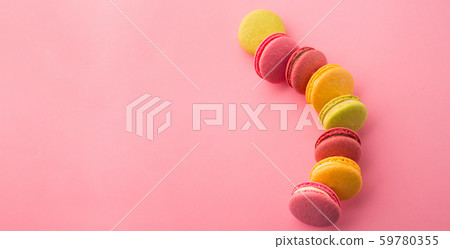 Sweet macarons on pink background Sweet macarons on pink background 59780355