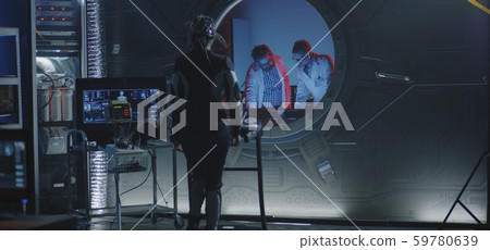 Female astronaut walking on treadmill Female astronaut walking on treadmill 59780639