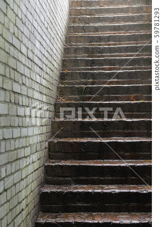 Stone stairs in an old German bunker . 59781293