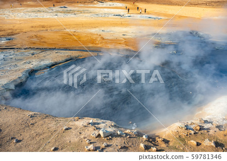 Fumarole field in Namafjall geothermal zone Iceland. Famous tourist attraction Fumarole field in Namafjall geothermal zone Iceland. Famous tourist attraction 59781346