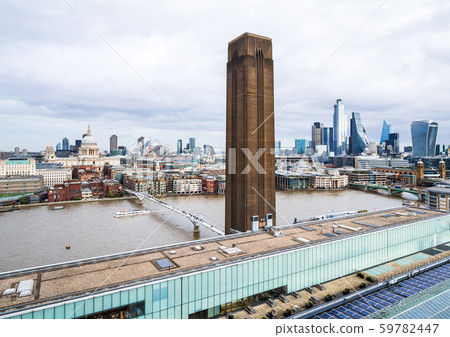 London, Tate Modern chimneys and streets along the Thames 59782447