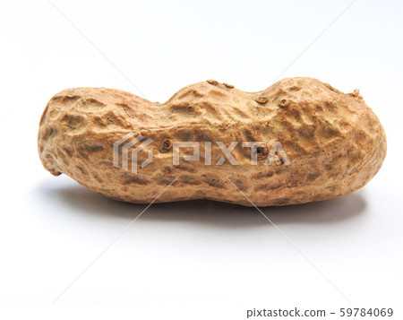 Top view of an raw unshelled peanuts also called groundnut isolated on white background. With edible seeds and high oil content. Oil crop. Food and Taiwan agriculture concept. 59784069