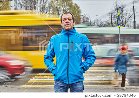 One sadness caucasian man older than 50 outdoors. 59784340