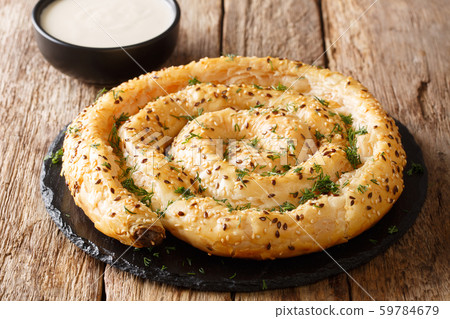 Snail pie borek (burek) from filo pastry with feta 59784679