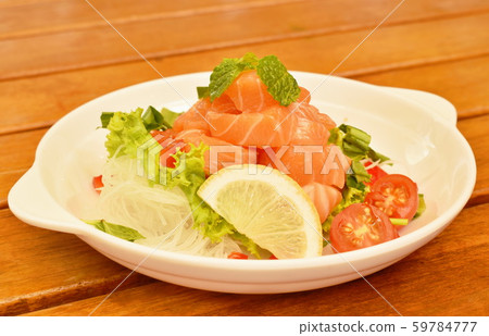 fresh salmon with vegetable spicy sauce salad on plate fresh salmon with vegetable spicy sauce salad on plate 59784777