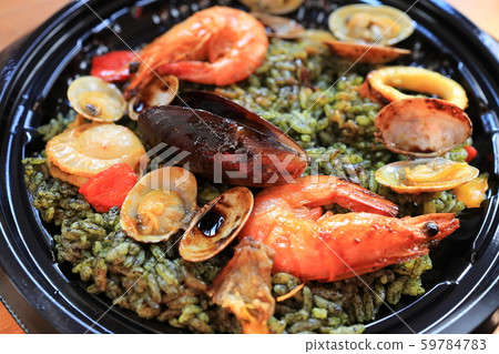 Delicious seafood paella Delicious seafood paella 59784783
