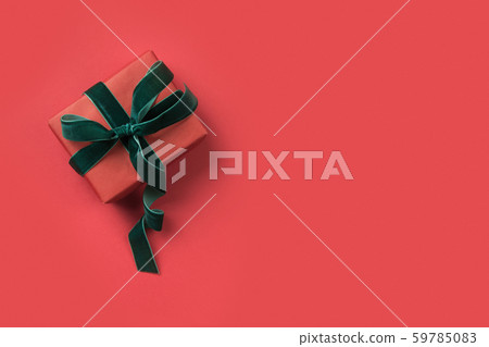 Christmas gift on red background. Boxing day. 59785083