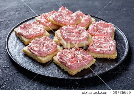 shortbread cookies with pink frosting, top view shortbread cookies with pink frosting, top view 59786699