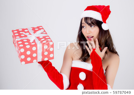 Beautiful portrait young asian woman happy holding red gift box with excited in xmas holiday 59787049