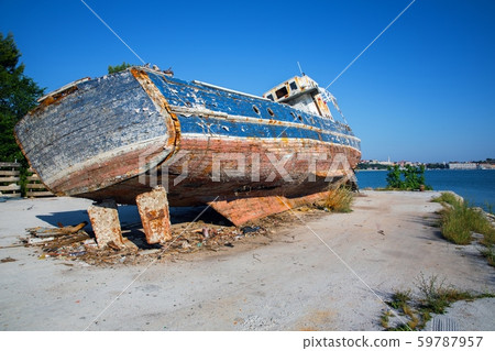 Old shipwreck at the harbor 59787957