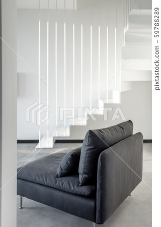White interior with couch and stairway White interior with couch and stairway 59788289