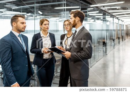 Group of business people in the hallway Group of business people in the hallway 59788871