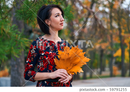 Beautiful elegant woman standing and posing with 59791255