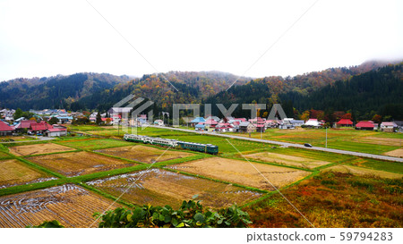 Tadami Line Nakagawa village and train Tadami Line Nakagawa village and train 59794283
