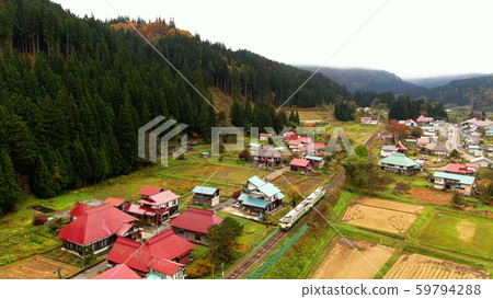 Tadami Line Nakagawa village and train Tadami Line Nakagawa village and train 59794288